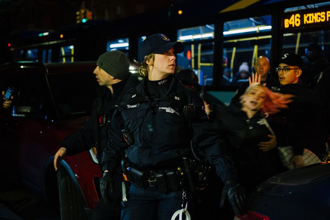 A protester is arrested in Brooklyn on Friday night.